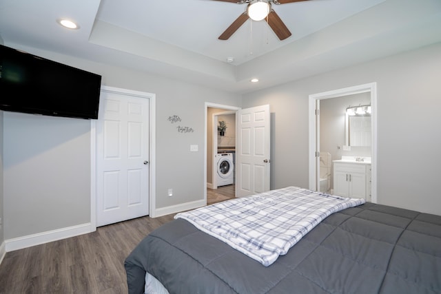 595 New Union Cir, Dayton, TN 37321 - bedroom featuring washer / dryer, wood finished floors, baseboards, recessed lighting, and a raised ceiling