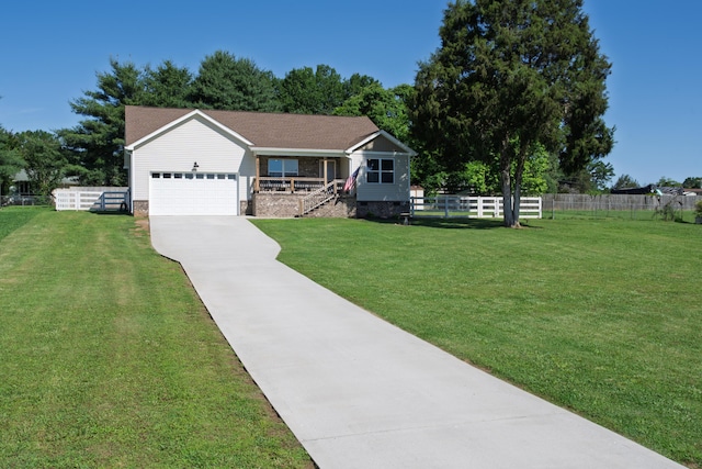 595 New Union Cir, Dayton, TN 37321 - view of front facade featuring driveway, a garage, and a porch