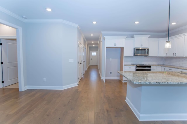 1681 Destiny Dr Unit 14, Hixson, TN 37343 - kitchen featuring appliances with stainless steel finishes, white cabinetry, decorative backsplash, light stone countertops, and recessed lighting