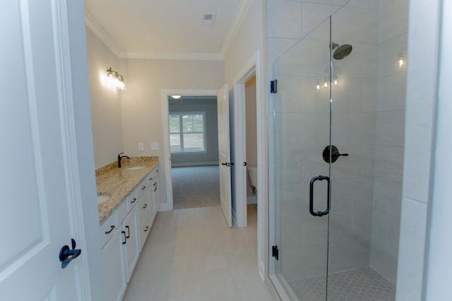 1681 Destiny Dr Unit 14, Hixson, TN 37343 - full bathroom featuring ornamental molding, double vanity, a stall shower, tile patterned floors, and toilet