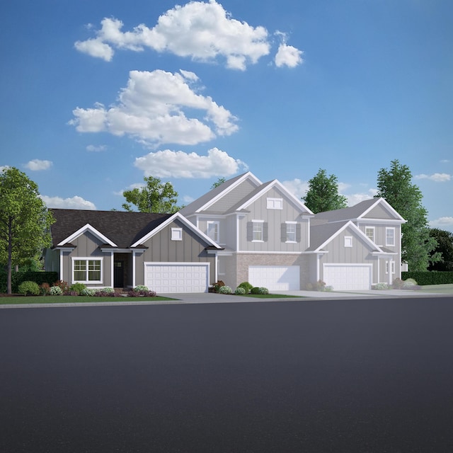 1681 Destiny Dr Unit 14, Hixson, TN 37343 - view of front of house with board and batten siding, concrete driveway, and an attached garage