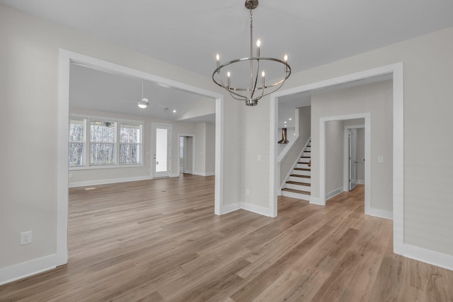 2592 Butlers Green Cir Unit 9, Chattanooga, TN 37421 - unfurnished room with stairs, a chandelier, light wood finished floors, ceiling fan, and baseboards
