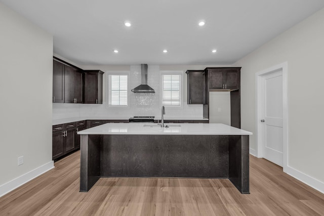 2592 Butlers Green Cir Unit 9, Chattanooga, TN 37421 - kitchen featuring a sink, wall chimney exhaust hood, a kitchen island with sink, light wood-style floors, and recessed lighting