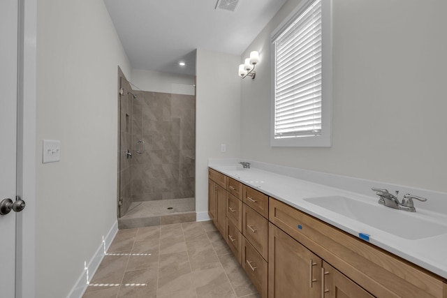 2592 Butlers Green Cir Unit 9, Chattanooga, TN 37421 - bathroom with a stall shower, baseboards, double vanity, and tile patterned flooring