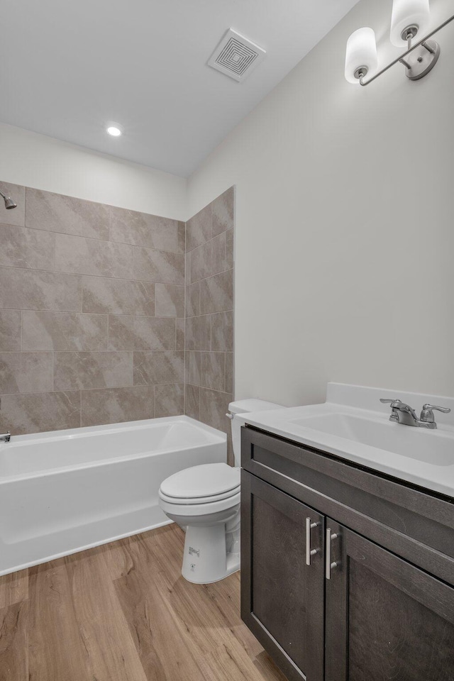 2592 Butlers Green Cir Unit 9, Chattanooga, TN 37421 - full bathroom with vanity, toilet, wood finished floors, and bathing tub / shower combination
