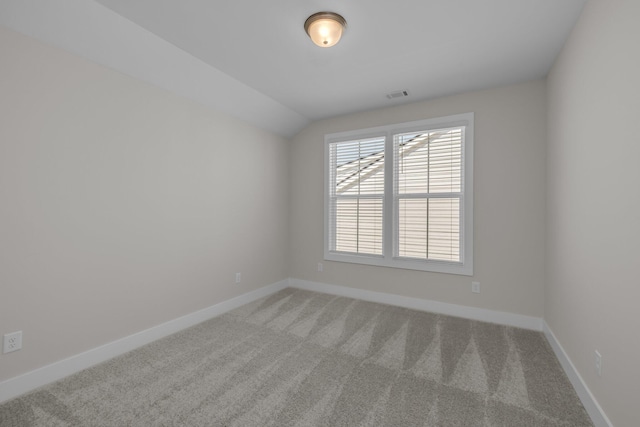 2592 Butlers Green Cir Unit 9, Chattanooga, TN 37421 - spare room with light carpet, baseboards, and vaulted ceiling