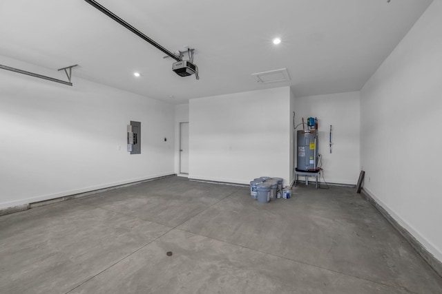 2592 Butlers Green Cir Unit 9, Chattanooga, TN 37421 - garage featuring electric panel, electric water heater, a garage door opener, recessed lighting, and baseboards