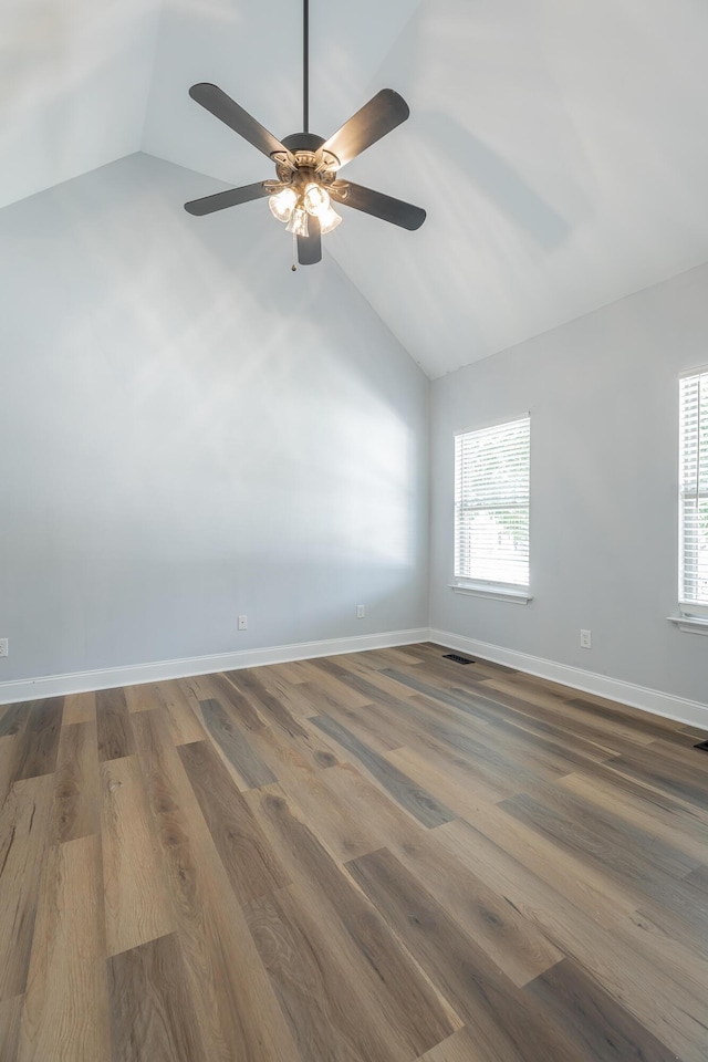 7762 Lynnle Way, Hixson, TN 37343 - unfurnished room with lofted ceiling, a ceiling fan, wood finished floors, and healthy amount of natural light