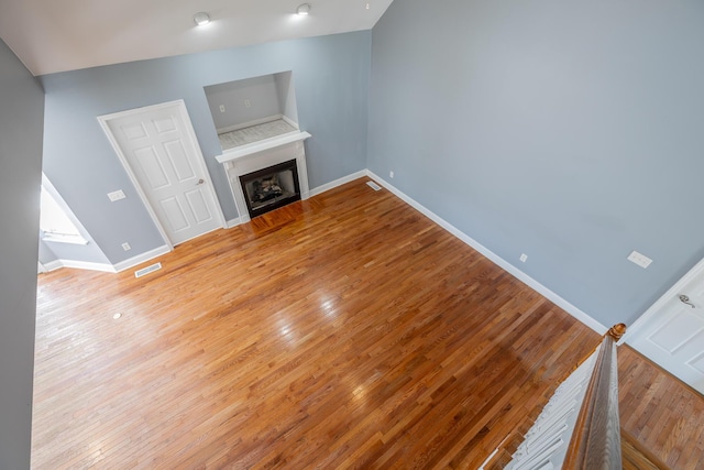 7762 Lynnle Way, Hixson, TN 37343 - unfurnished living room featuring light wood-type flooring and a fireplace