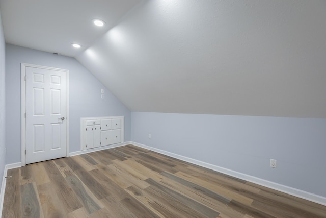 7762 Lynnle Way, Hixson, TN 37343 - additional living space featuring vaulted ceiling, wood finished floors, and recessed lighting