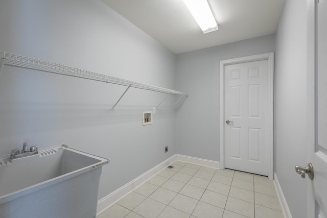 7762 Lynnle Way, Hixson, TN 37343 - laundry area featuring hookup for a washing machine and light tile patterned floors