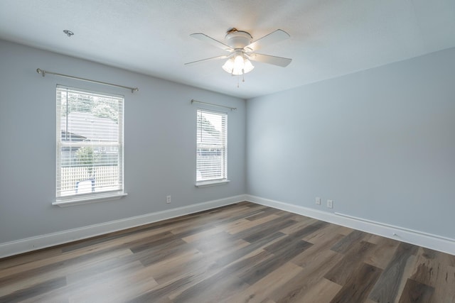 7762 Lynnle Way, Hixson, TN 37343 - unfurnished room featuring ceiling fan and dark wood-style floors