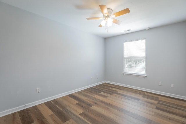 7762 Lynnle Way, Hixson, TN 37343 - unfurnished room with dark wood-type flooring and a ceiling fan