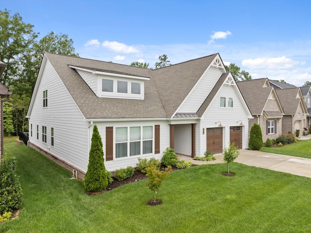 1590 Buttonwood Unit 20, Chattanooga, TN 37421 - view of front of home with concrete driveway, a shingled roof, a front yard, and an attached garage