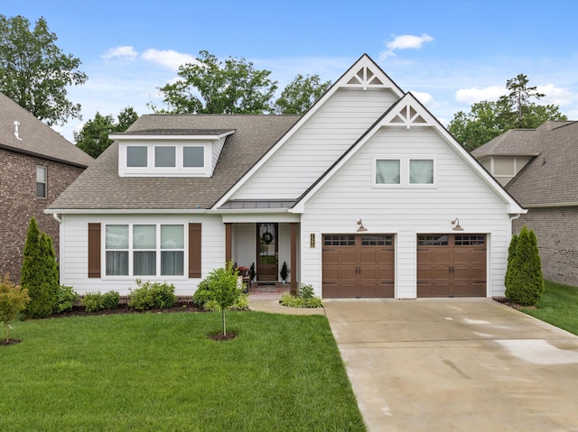 1590 Buttonwood Unit 20, Chattanooga, TN 37421 - view of front of house featuring a shingled roof, a front yard, concrete driveway, and a garage
