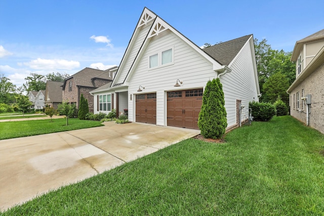1590 Buttonwood Unit 20, Chattanooga, TN 37421 - view of front of property featuring driveway, a front yard, a garage, and roof with shingles