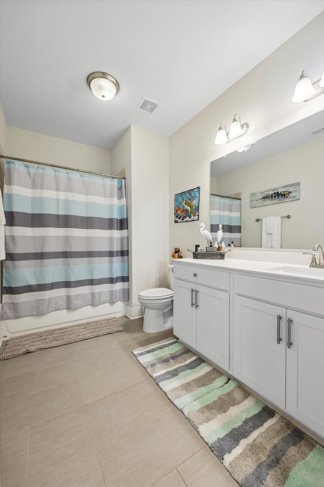 1590 Buttonwood Unit 20, Chattanooga, TN 37421 - bathroom with double vanity, toilet, and a shower with curtain