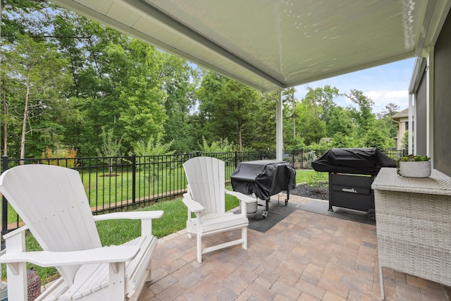 1590 Buttonwood Unit 20, Chattanooga, TN 37421 - view of patio with area for grilling and view of wooded area