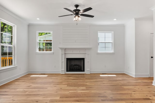 3563 Knollwood Hill Dr, Chattanooga, TN 37415 - unfurnished living room with ornamental molding, plenty of natural light, baseboards, light wood-style floors, and a fireplace