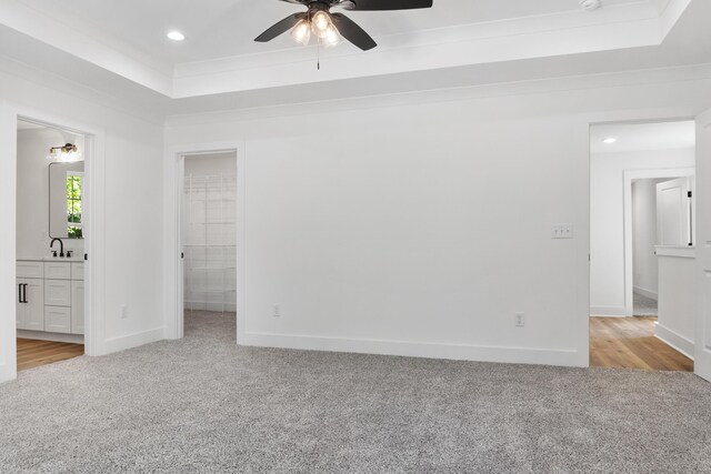 3563 Knollwood Hill Dr, Chattanooga, TN 37415 - unfurnished bedroom with carpet flooring, a raised ceiling, recessed lighting, baseboards, and a walk in closet