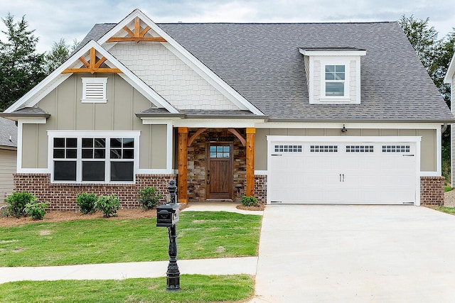 8868 Knolling Loop Unit 36, Ooltewah, TN 37363 - craftsman-style house featuring brick siding, a garage, and roof with shingles