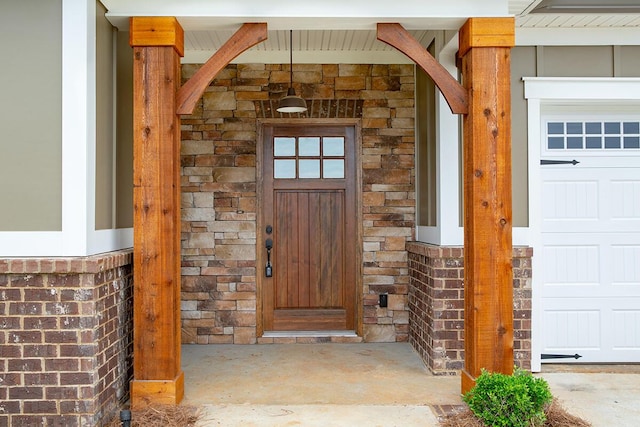 8868 Knolling Loop Unit 36, Ooltewah, TN 37363 - property entrance with stone siding and a garage