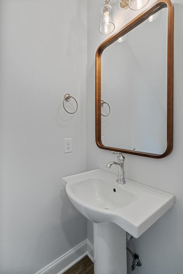 607 Westover Dr SW, Cleveland, TN 37311 - bathroom with baseboards and wood finished floors