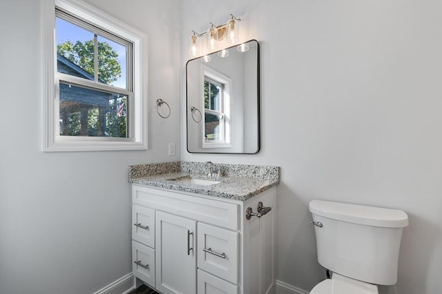 607 Westover Dr SW, Cleveland, TN 37311 - bathroom with vanity, baseboards, and toilet