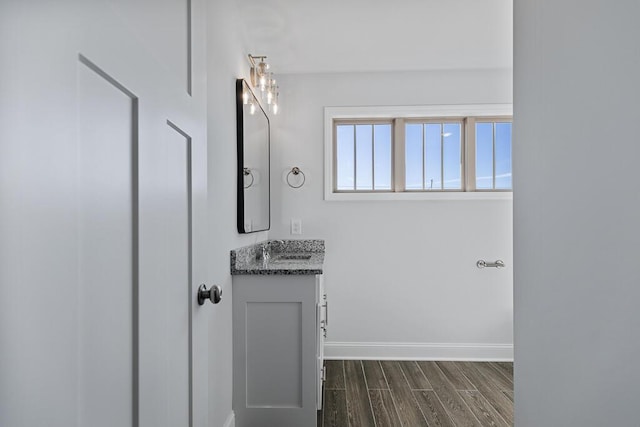 607 Westover Dr SW, Cleveland, TN 37311 - bathroom featuring vanity, wood finished floors, and baseboards