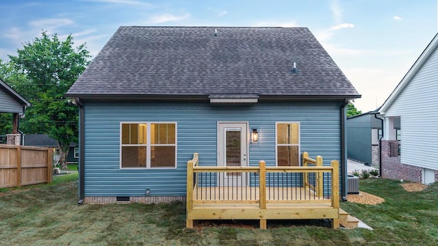 607 Westover Dr SW, Cleveland, TN 37311 - rear view of house with a shingled roof, a wooden deck, a yard, and central air condition unit