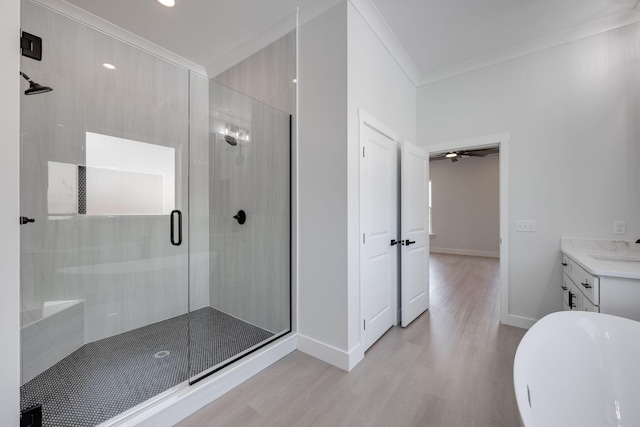 6221 Alexandra Pl, Chattanooga, TN 37416 - bathroom with wood finished floors, a shower stall, ornamental molding, vanity, and baseboards