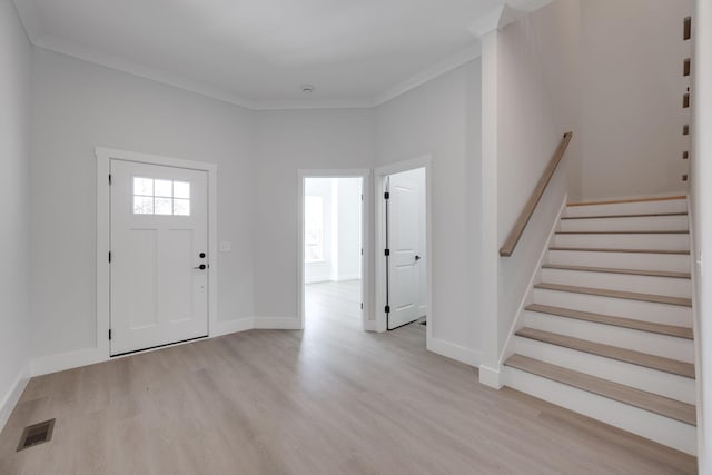 6221 Alexandra Pl, Chattanooga, TN 37416 - entrance foyer with light wood-style floors, stairs, baseboards, and crown molding