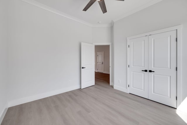 6221 Alexandra Pl, Chattanooga, TN 37416 - unfurnished bedroom with crown molding, light wood-style flooring, baseboards, a closet, and ceiling fan
