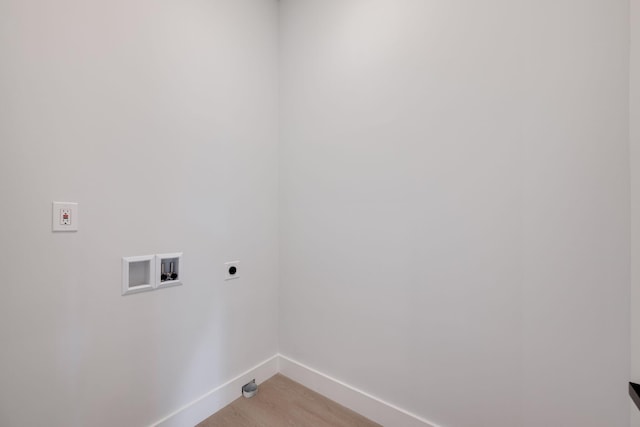 6221 Alexandra Pl, Chattanooga, TN 37416 - washroom featuring hookup for an electric dryer, baseboards, washer hookup, and light wood-style flooring