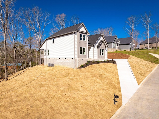 6221 Alexandra Pl, Chattanooga, TN 37416 - view of home's exterior with crawl space, board and batten siding, cooling unit, and a residential view