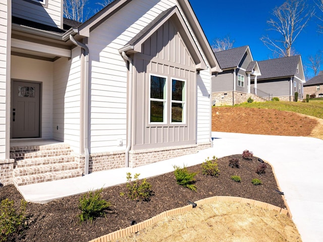 6221 Alexandra Pl, Chattanooga, TN 37416 - view of exterior entry with board and batten siding and brick siding