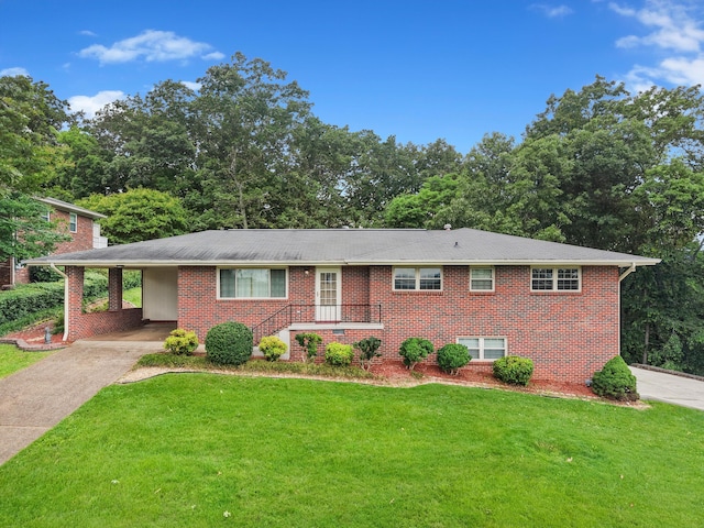 5839 Crestview Dr, Hixson, TN 37343 - ranch-style home with concrete driveway, a front yard, and brick siding