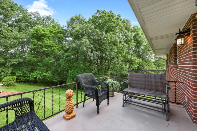 5839 Crestview Dr, Hixson, TN 37343 - view of patio / terrace with view of wooded area