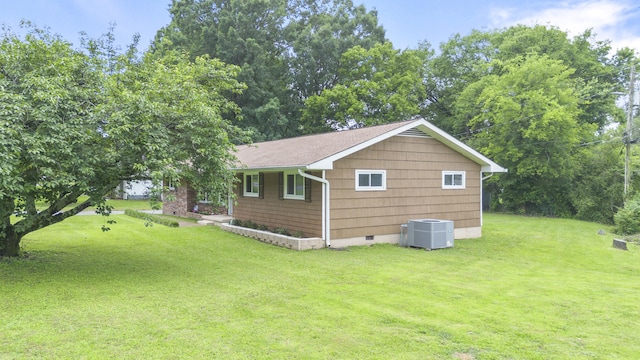 1331 Phils Dr, Chattanooga, TN 37421 - view of home's exterior featuring central AC unit, a yard, and crawl space