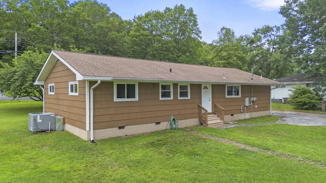 1331 Phils Dr, Chattanooga, TN 37421 - single story home featuring crawl space, entry steps, central air condition unit, roof with shingles, and a front lawn