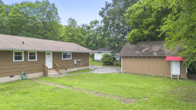 1331 Phils Dr, Chattanooga, TN 37421 - view of grassy yard featuring entry steps