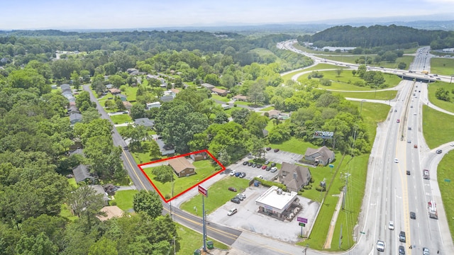 1331 Phils Dr, Chattanooga, TN 37421 - view of property location featuring a major roadway, property parcel outlined, and a heavily wooded area