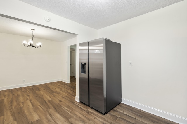 1331 Phils Dr, Chattanooga, TN 37421 - kitchen featuring stainless steel fridge, a chandelier, dark wood-style flooring, and baseboards