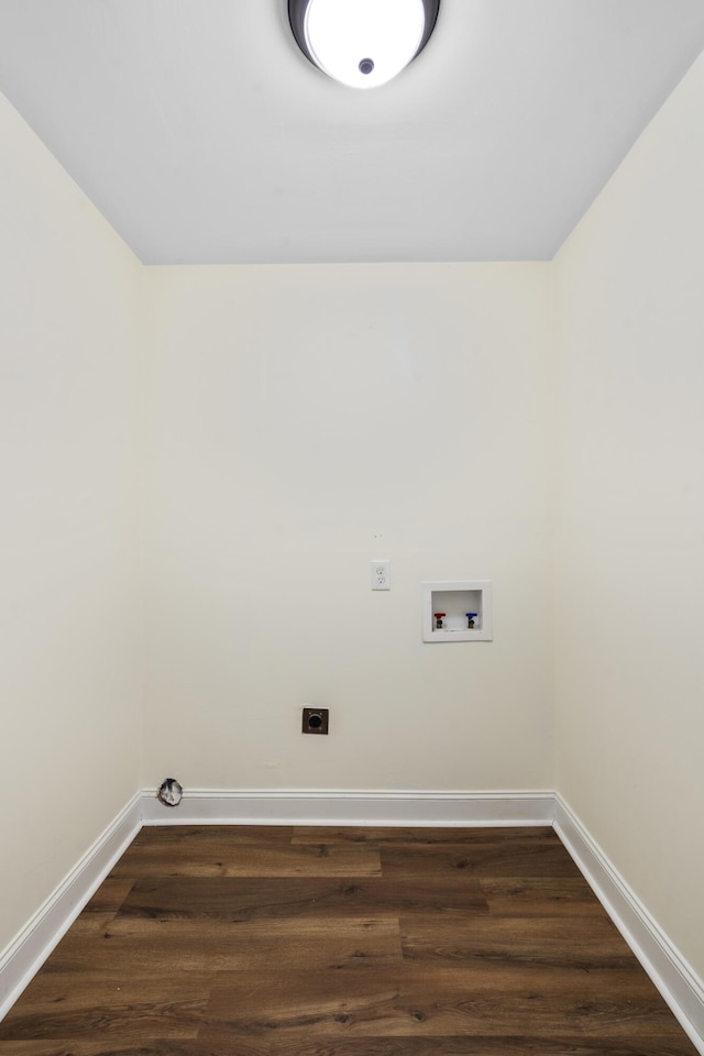 1331 Phils Dr, Chattanooga, TN 37421 - laundry area featuring hookup for a washing machine, electric dryer hookup, dark wood-type flooring, and baseboards