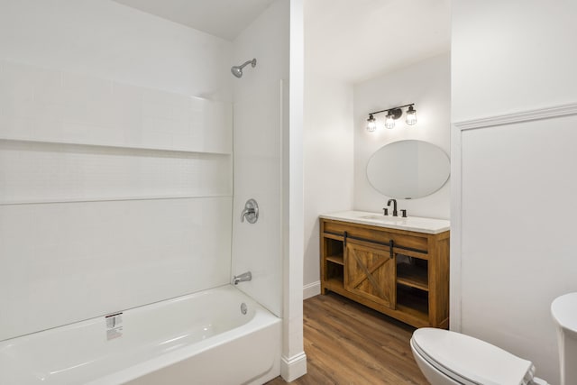 1331 Phils Dr, Chattanooga, TN 37421 - full bath with wood finished floors, toilet, shower / bath combination, vanity, and baseboards