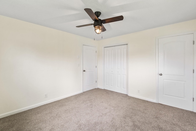 1331 Phils Dr, Chattanooga, TN 37421 - unfurnished bedroom featuring carpet, baseboards, a closet, and a ceiling fan