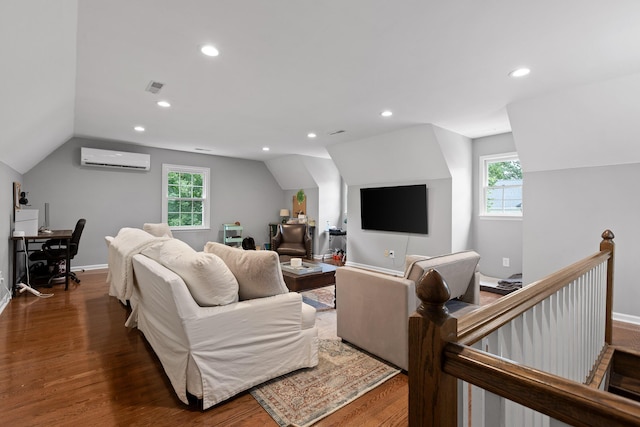 9334 Royal Mountain Dr, Chattanooga, TN 37421 - living room featuring a wall mounted AC, vaulted ceiling, wood finished floors, healthy amount of natural light, and an office area