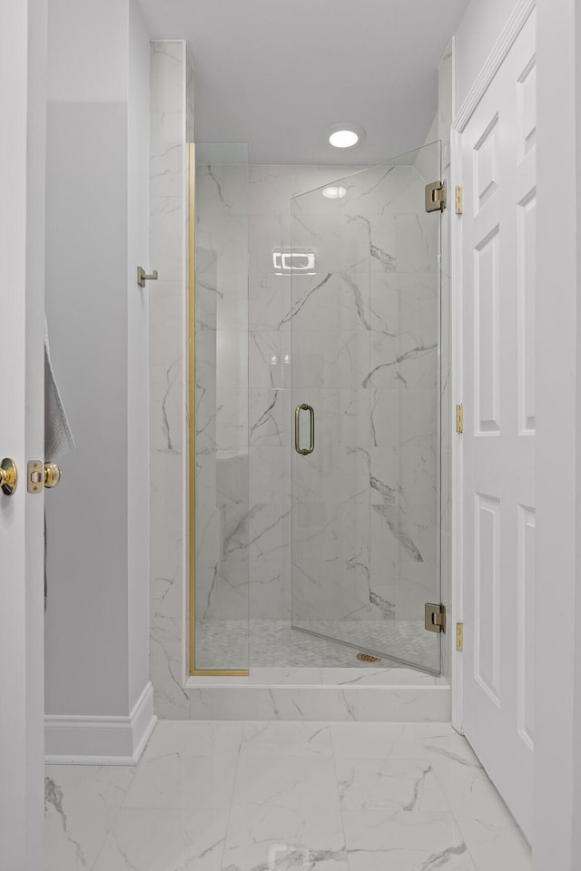 9334 Royal Mountain Dr, Chattanooga, TN 37421 - full bathroom featuring marble look tiles and a marble finish shower