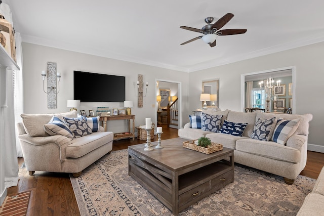 9334 Royal Mountain Dr, Chattanooga, TN 37421 - living area featuring crown molding, ceiling fan, a chandelier, wood finished floors, and stairs