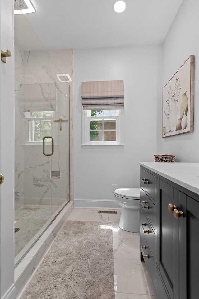 9334 Royal Mountain Dr, Chattanooga, TN 37421 - bathroom with healthy amount of natural light, marble finish floors, a marble finish shower, vanity, and recessed lighting